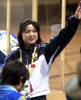 Fukushima waves to supporters after taking 5th in pistol event